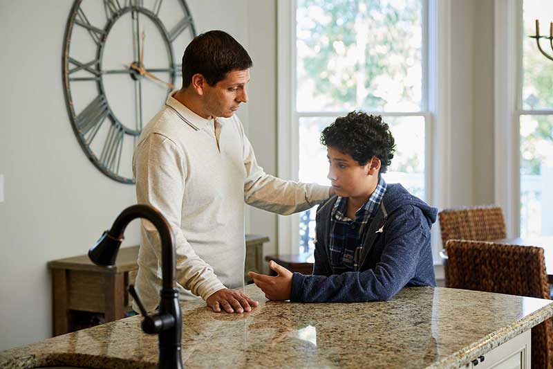parent consoling upset child